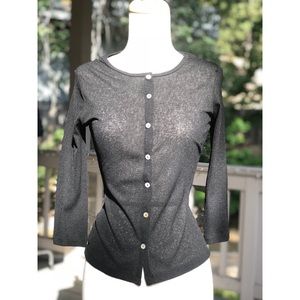 A thin, black cardigan.